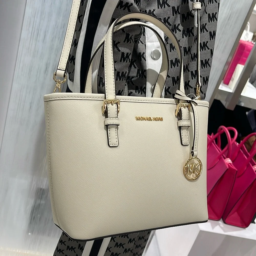 Michael Kors Jet Set Travel Extra-Small Top-Zip Tote Carryall Bag
Light Cream - Picture 15 of 16